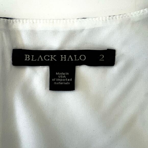 Black Halo Amelie Cap-Sleeve Sheath Dress in Tyrian Tides 2 - Picture 9 of 11